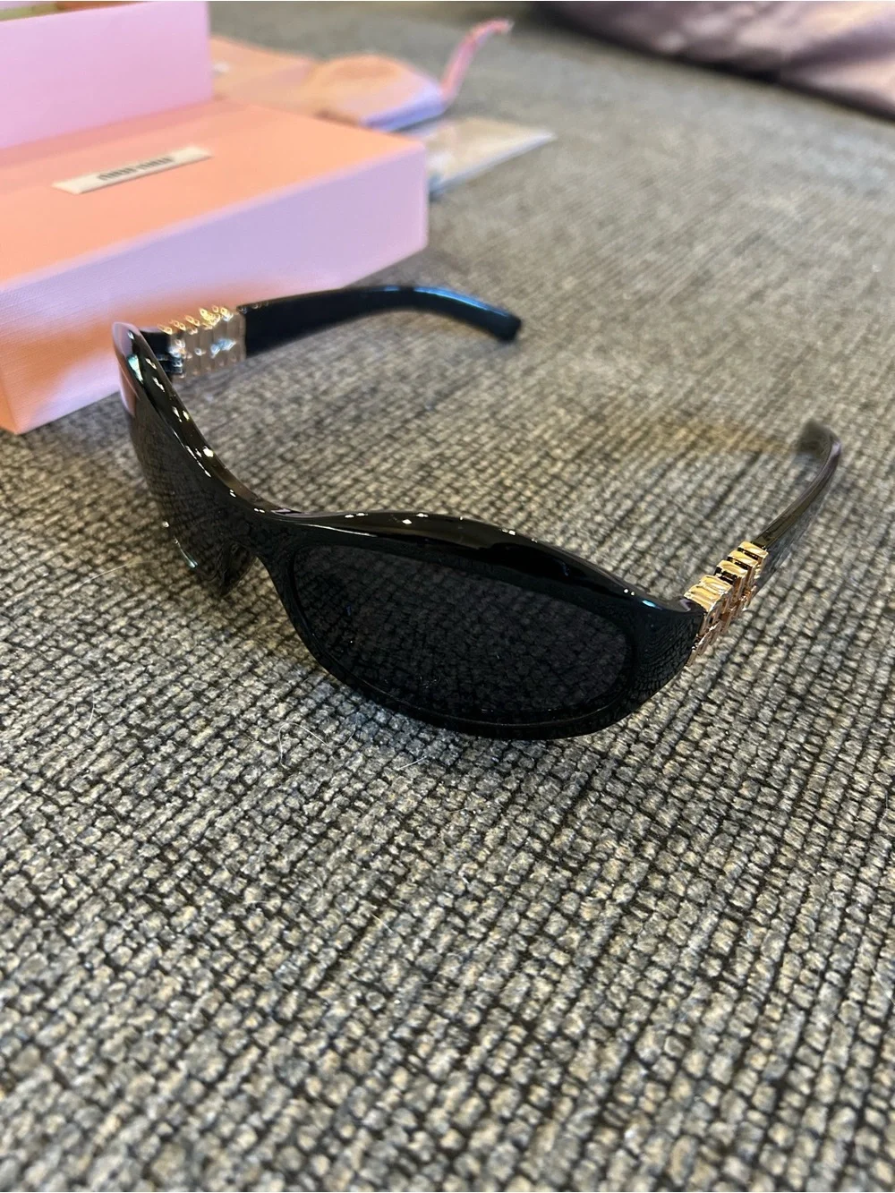 Miu Miu Black Sunglasses with Gold Temple Accents